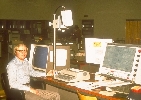 Jim Burgess with Paulaner mug at the TR440 operator console
